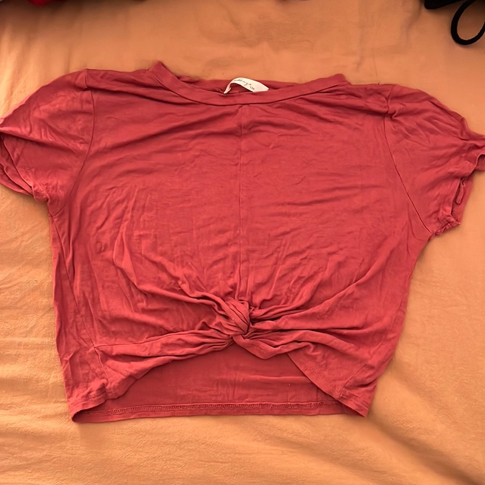 Size medium terracotta colored crop tee